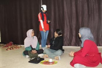Young people perform a play.