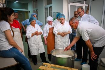 Kholoud and other local women during the on-job training in formajo production kitchen in ader, karak. (photo credit: habibi association)