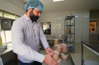 Inside healthy choice kitchen, the team preparing balanced meals with care and attention.
