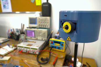 A close-up of one laser-based prototype setup in bashar’s workspace.