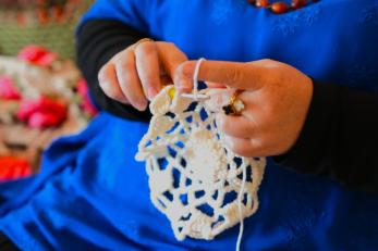 Areej malkawi showcasing the craftsmanship behind her handmade pieces.