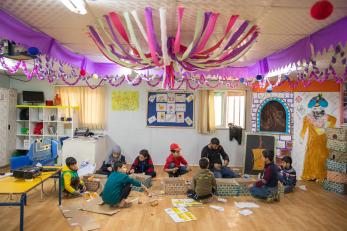 Young people gathered together for a craft activity.