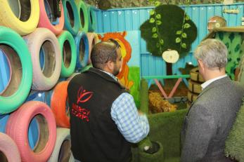 People touring the interactive playground. 