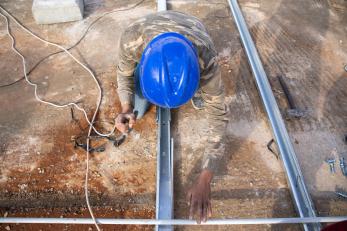 A person working on a construction project.