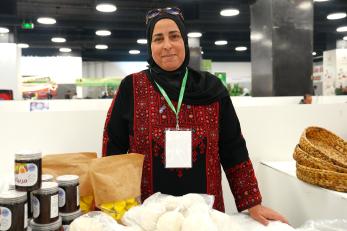 Program Participant at an olive festival.