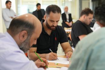 Business owners in Al - Karak Governorate participate in an intensive capacity-building session, learning to translate their passion into market-ready operations.